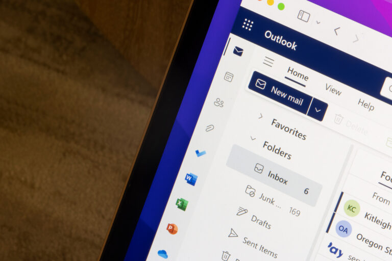 Close-up of the Outlook search interface showing the inbox and new mail button.