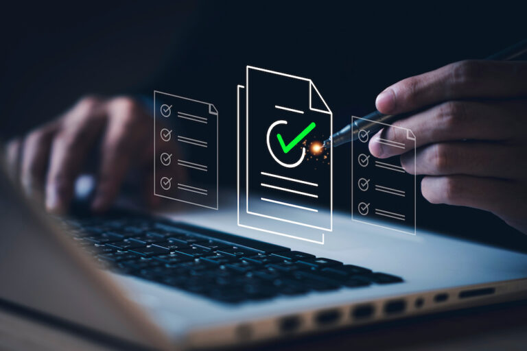 Person using a laptop with digital icons of checklists and a document with a green check mark.